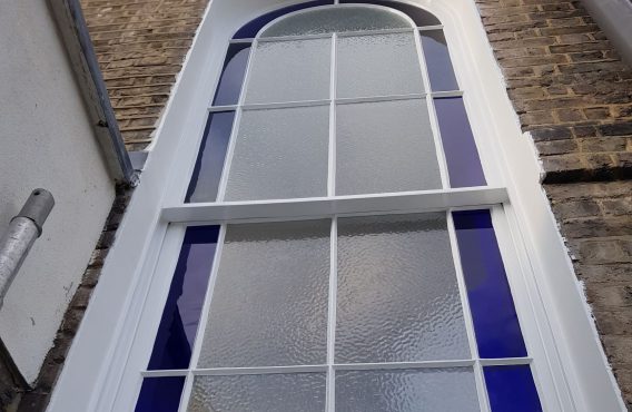 Blue Glass Sash Window After