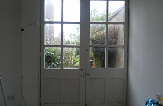 Wooden door before replacement